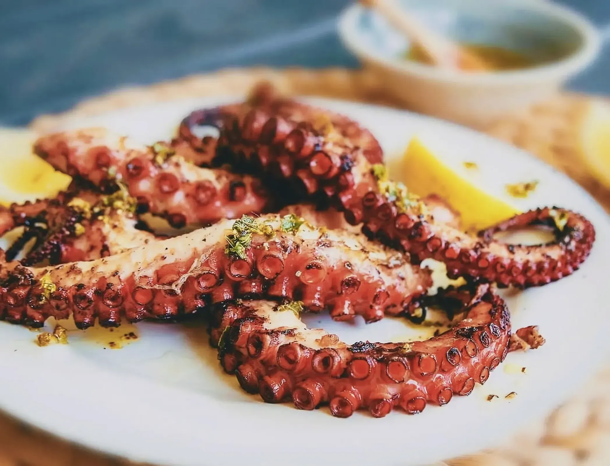 Delicately prepared dish of cooked octopus served on a plate
