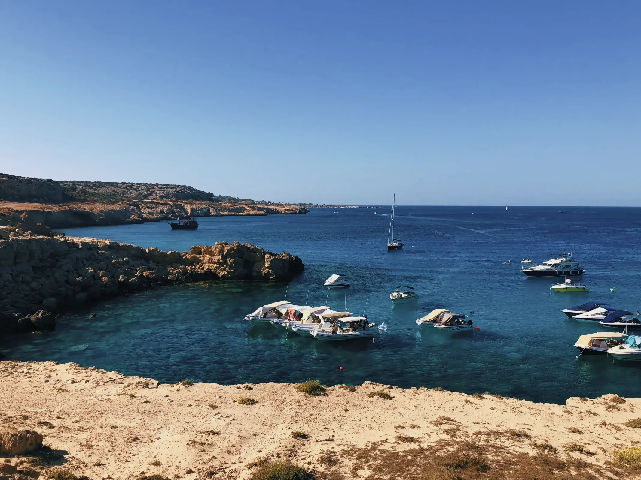 Boats on the water at Cape Greco National Park